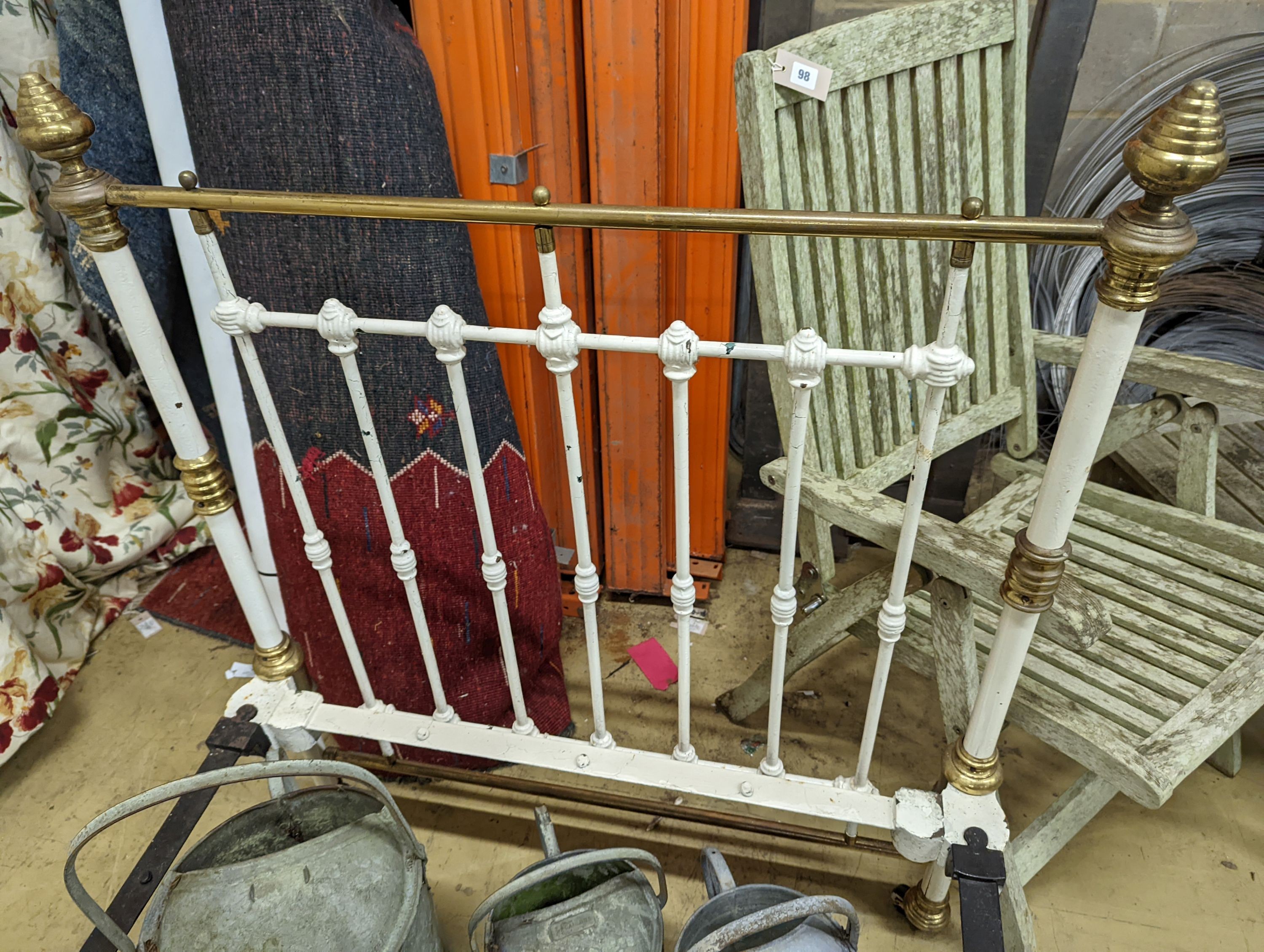 A Victorian painted brass mounted iron single bed frame. Length 202cm, Width-94cm, Height-145cm.